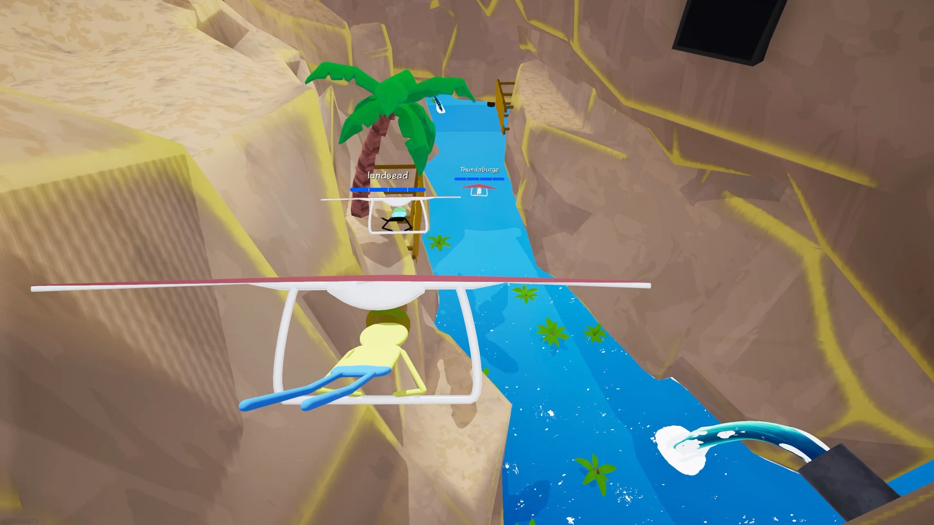 渓谷の水路上を滑空するゲーム画面