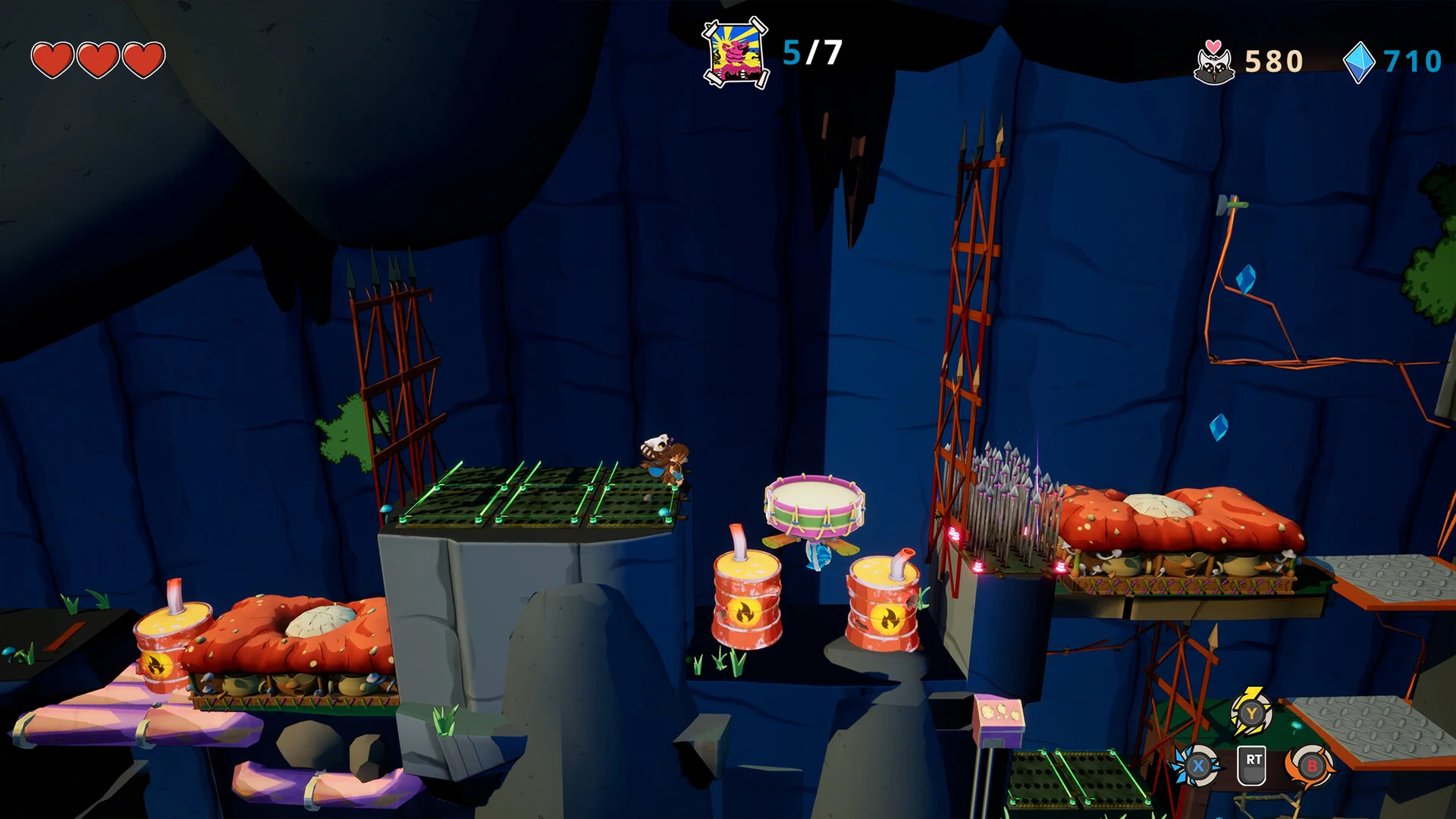 青い洞窟でキャラクターが足場を渡るゲーム画面