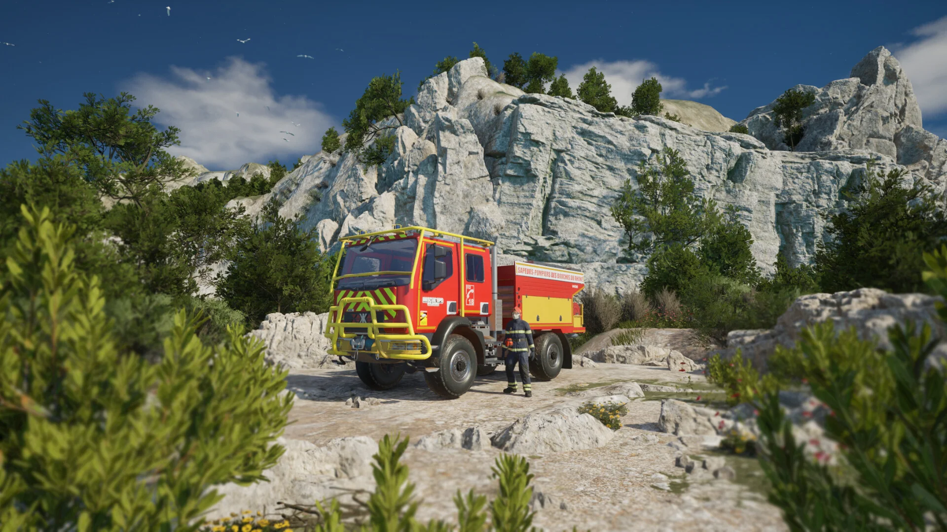 岩山の前に停まる赤と黄色の消防車と隊員のゲーム画面