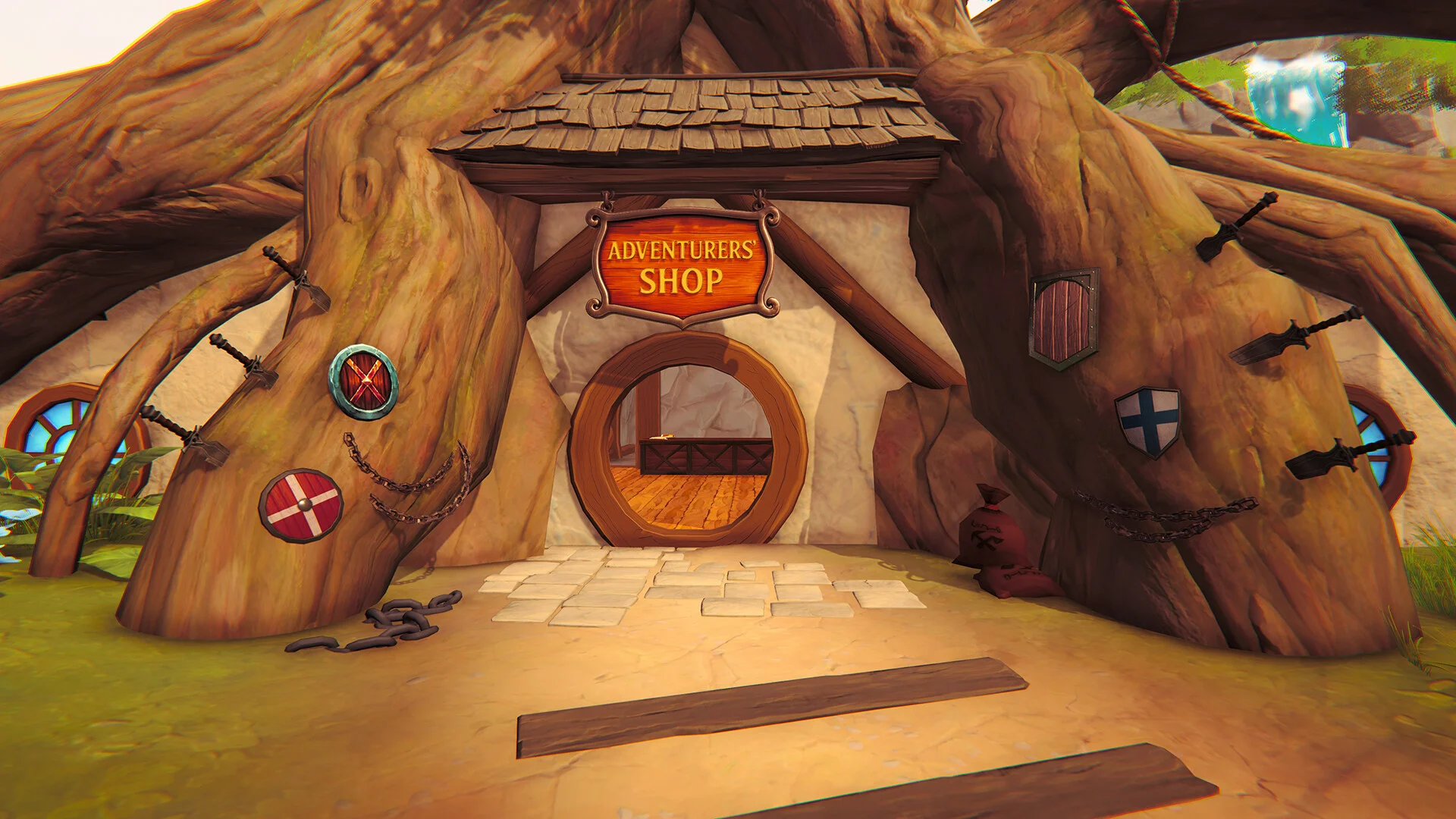 木の根元に作られた「ADVENTURERS SHOP」の丸い入口と盾の飾り
