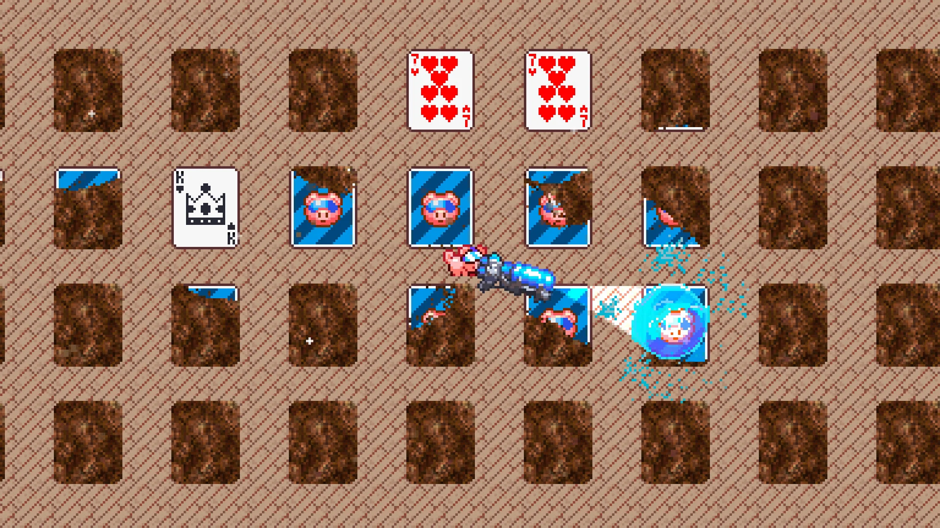 茶色の土の穴とトランプ、ブタ柄の青いカードが並ぶゲーム画面